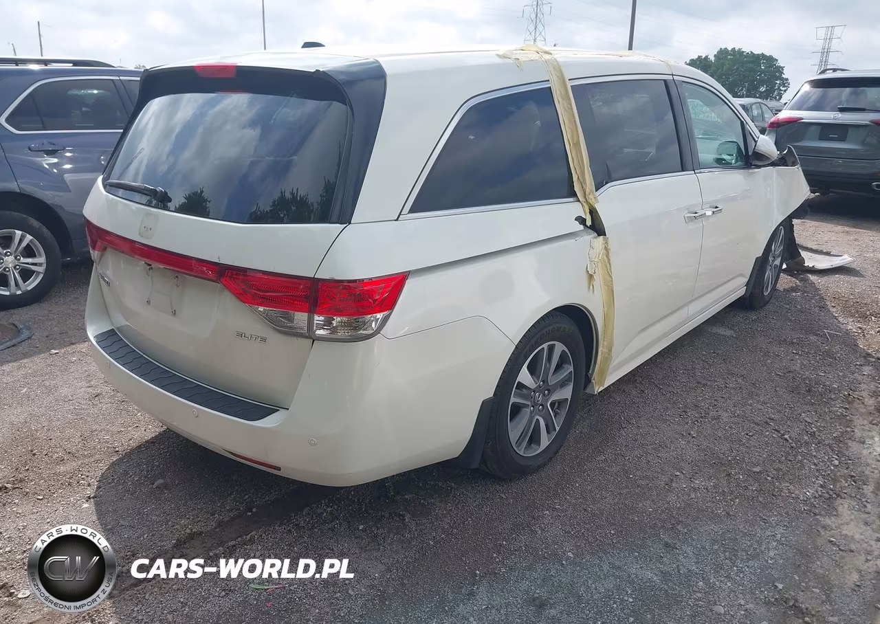 2015 Honda Odyssey Touring-Touring Elite VIN:5FNRL5H91FB050026 - 4