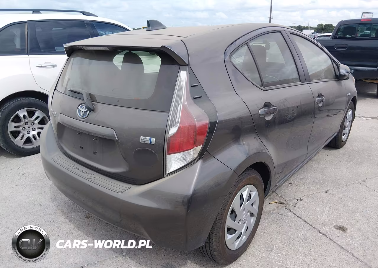2015 Toyota Prius C One VIN:JTDKDTB35F1099472 - 4