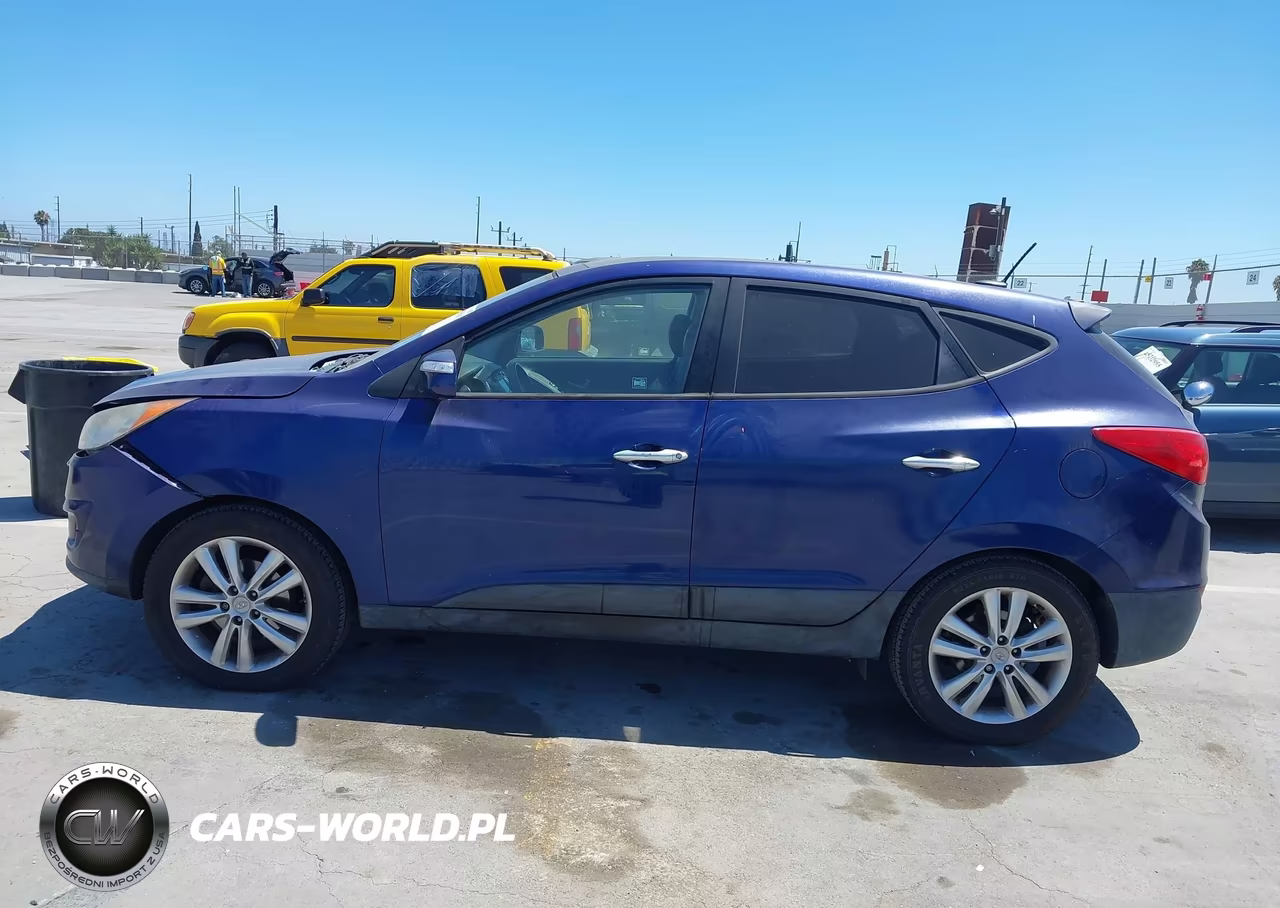 2011 Hyundai Tucson Limited VIN:KM8JUCACXBU141426 - 14