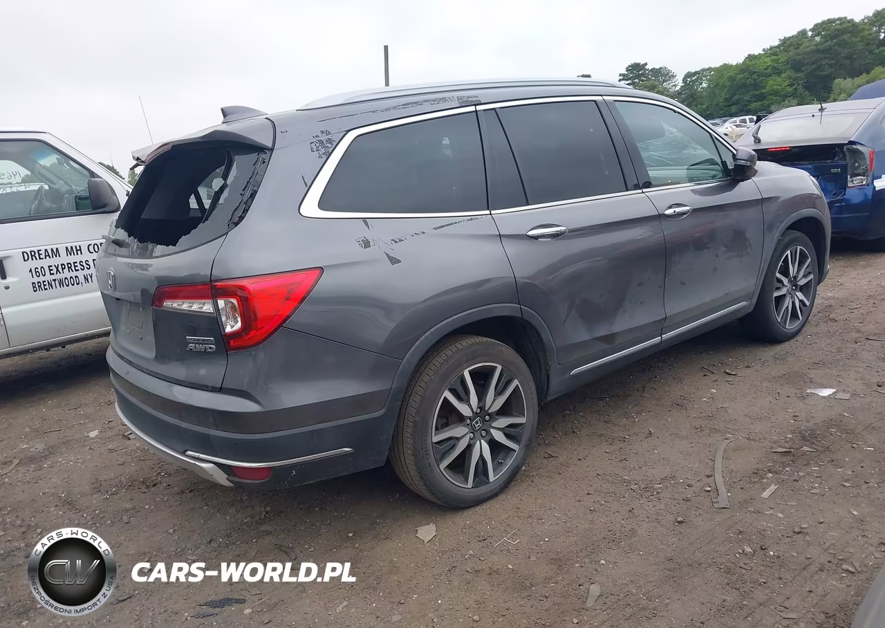 2019 Honda Pilot Touring VIN:5FNYF6H9XKB023037 - 4
