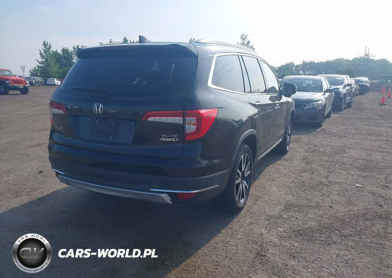 2019 Honda Pilot Elite VIN:5FNYF6H04KB061672 - 4