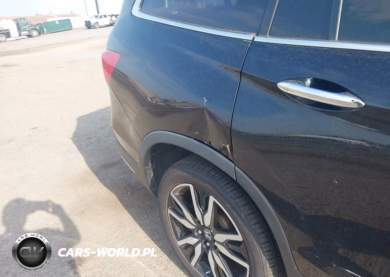 2019 Honda Pilot Elite VIN:5FNYF6H04KB061672 - 6