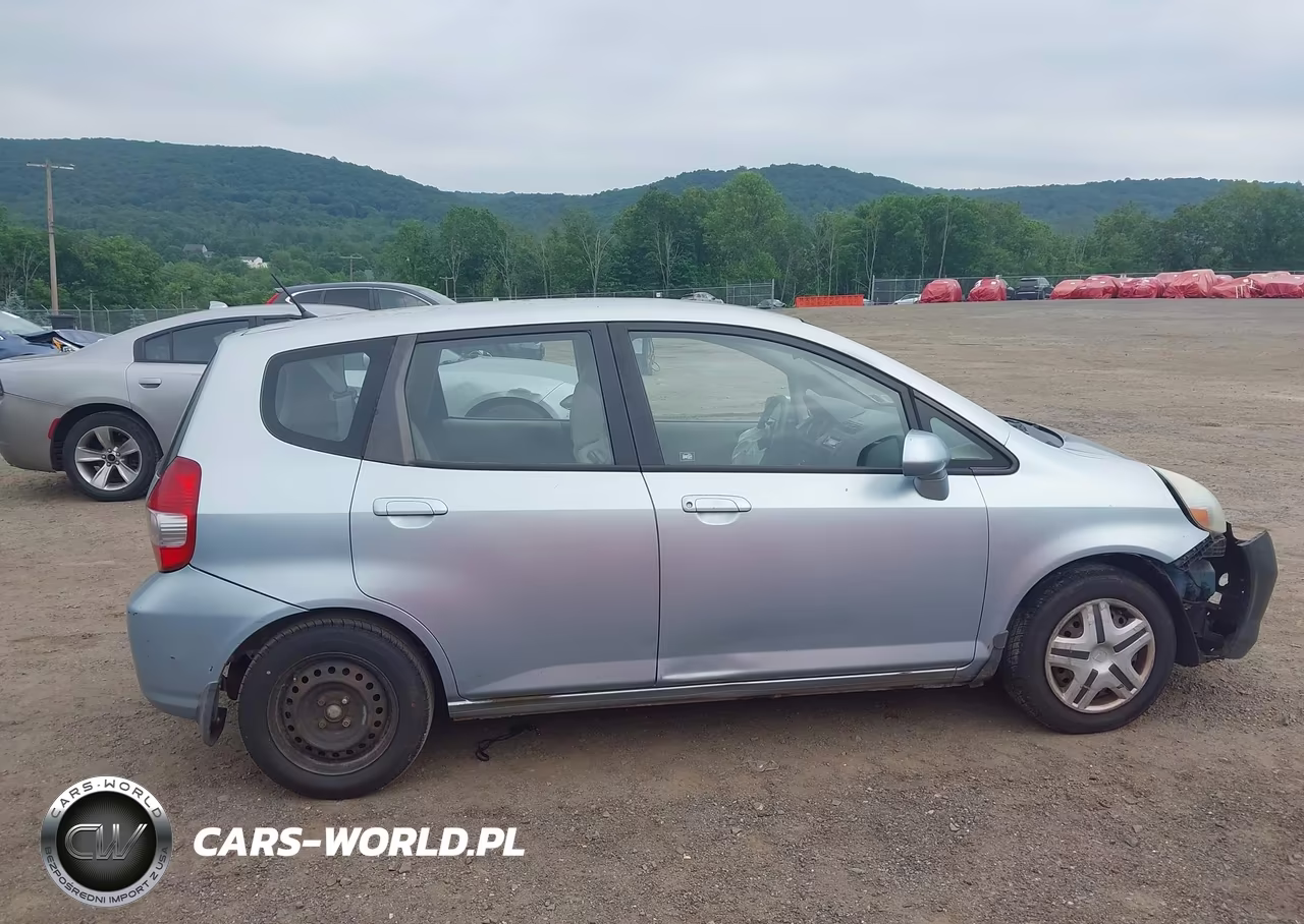 2007 Honda Fit VIN:JHMGD38457S007065 - 13