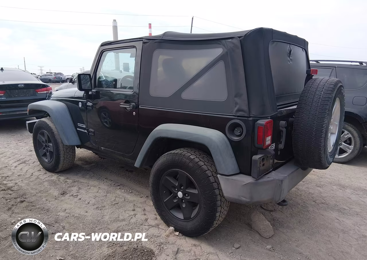 2012 Jeep Wrangler Sport VIN:1C4AJWAGXCL256312 - 3
