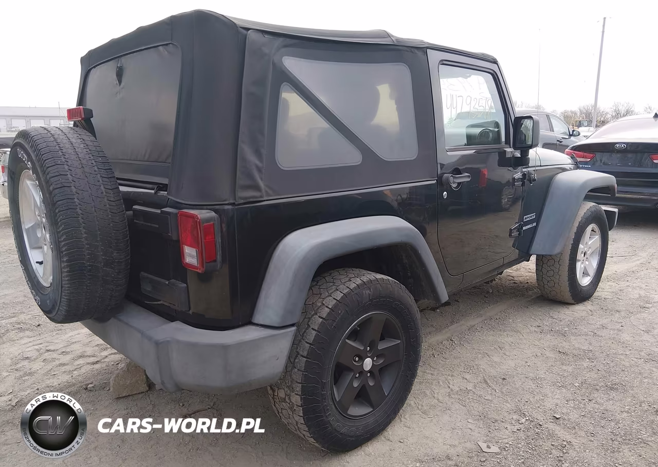 2012 Jeep Wrangler Sport VIN:1C4AJWAGXCL256312 - 4