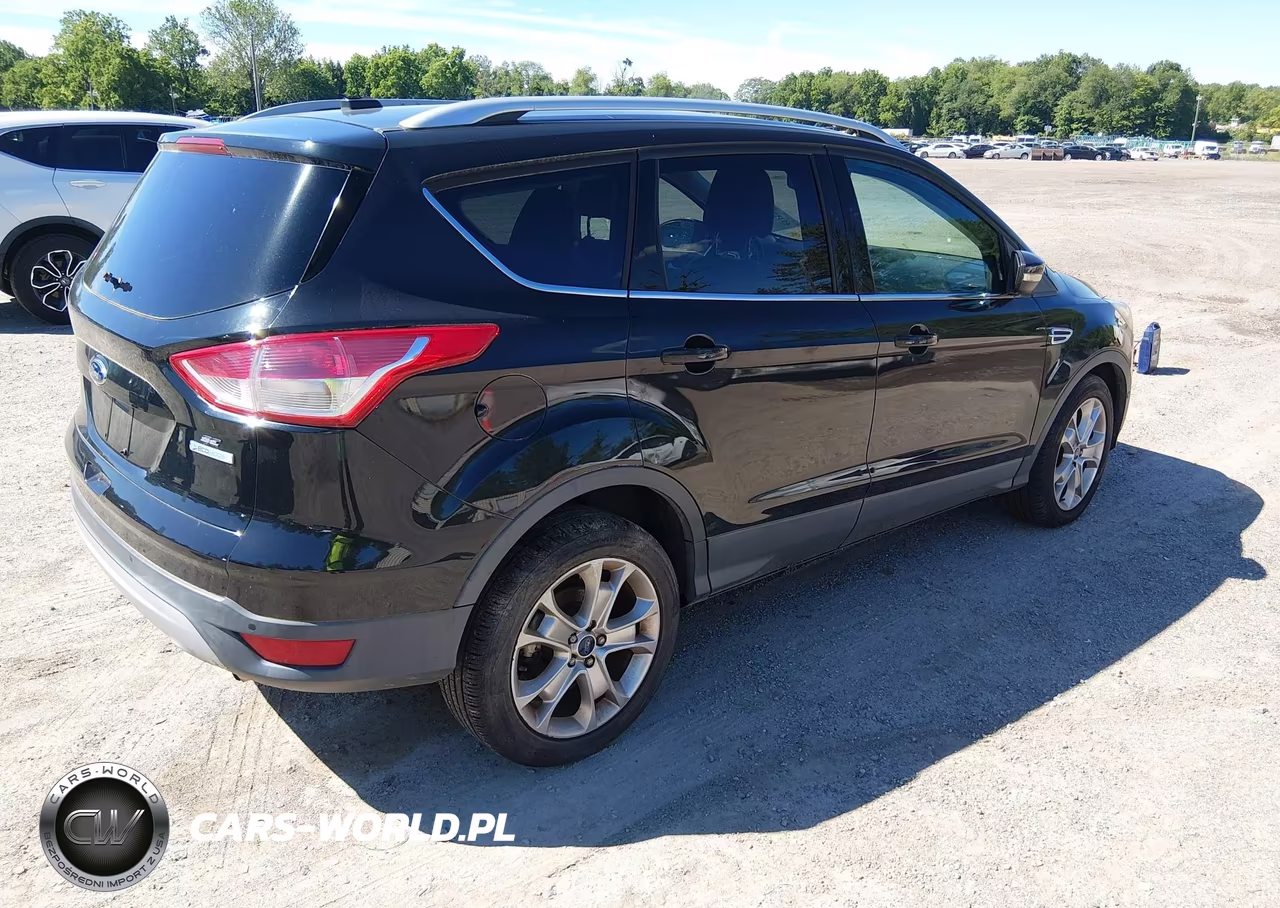 2014 Ford Escape Titanium VIN:1FMCU9J93EUB91136 - 4