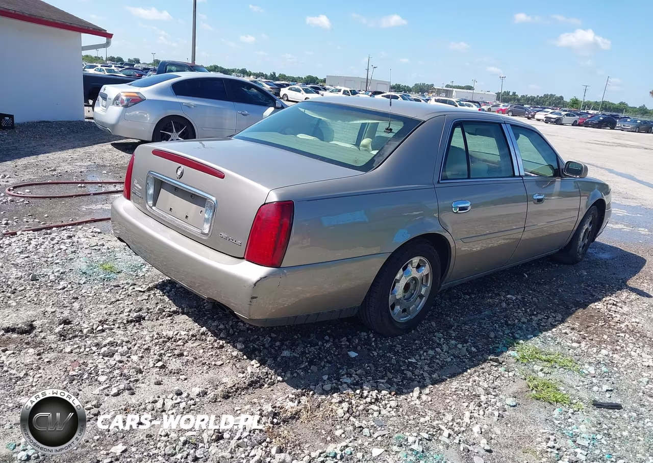 2001 Cadillac Deville Standard VIN:1G6KD54YX1U167067 - 4