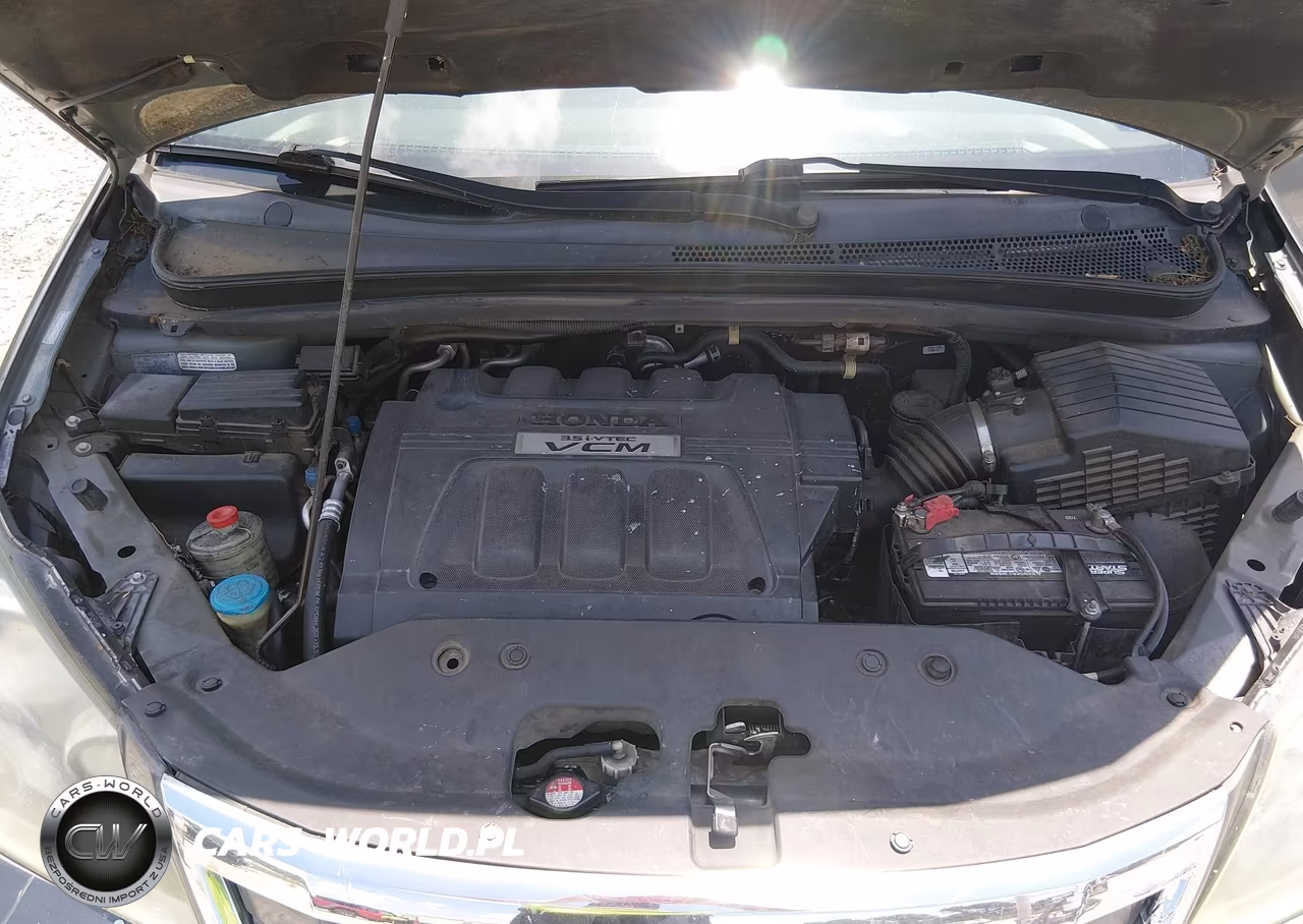 2010 Honda Odyssey Ex-L VIN:5FNRL3H74AB096574 - 10