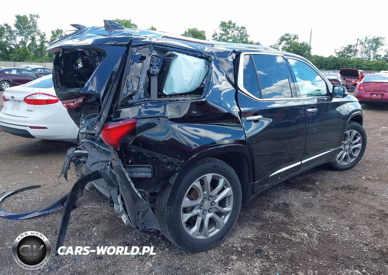 2018 Chevrolet Traverse Premier VIN:1GNEVJKW4JJ235437 - 4