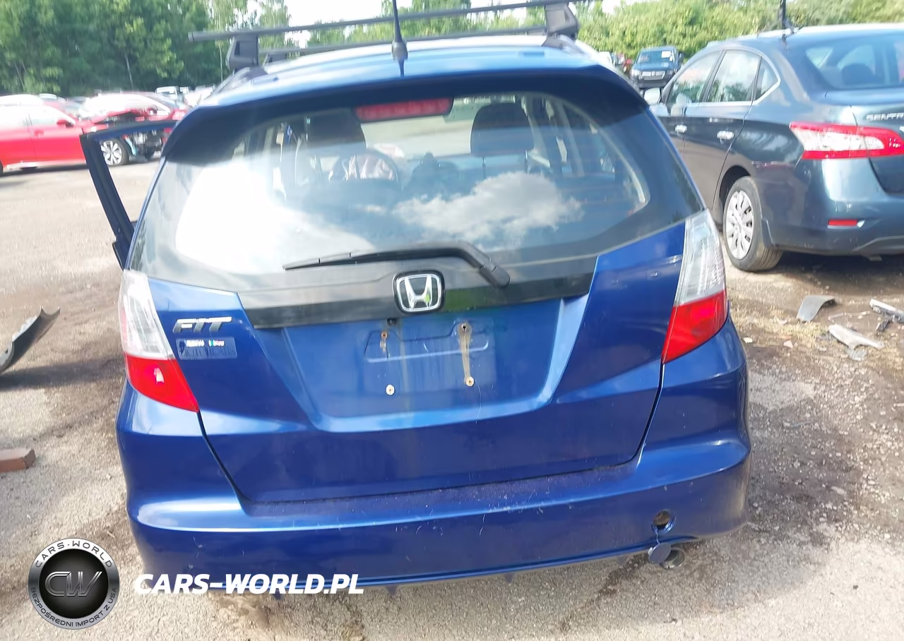 2013 Honda Fit Sport VIN:JHMGE8H5XDC054648 - 16