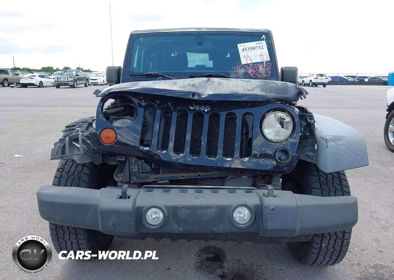 2011 Jeep Wrangler Sport VIN:1J4AA2D19BL580604 - 12