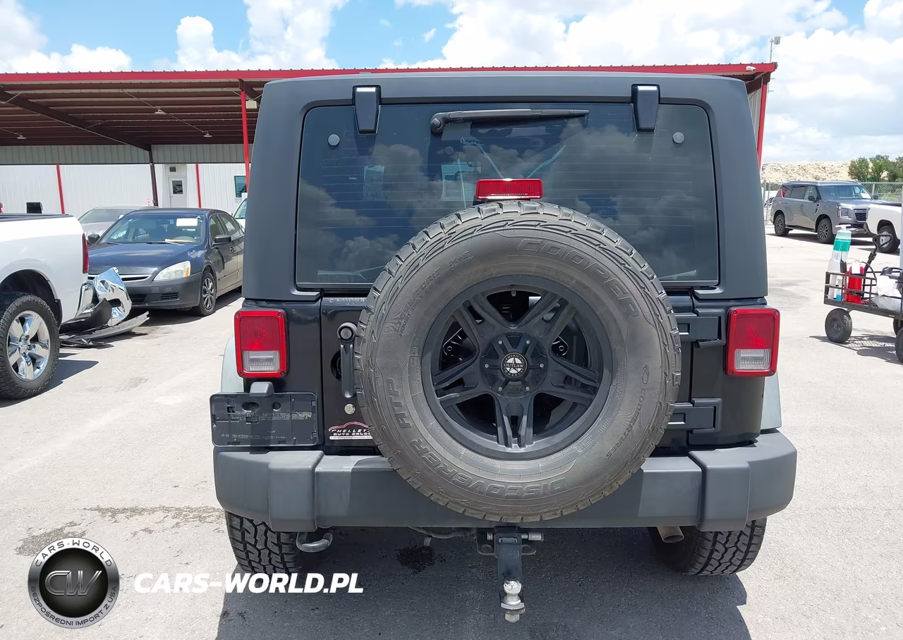 2011 Jeep Wrangler Sport VIN:1J4AA2D19BL580604 - 16