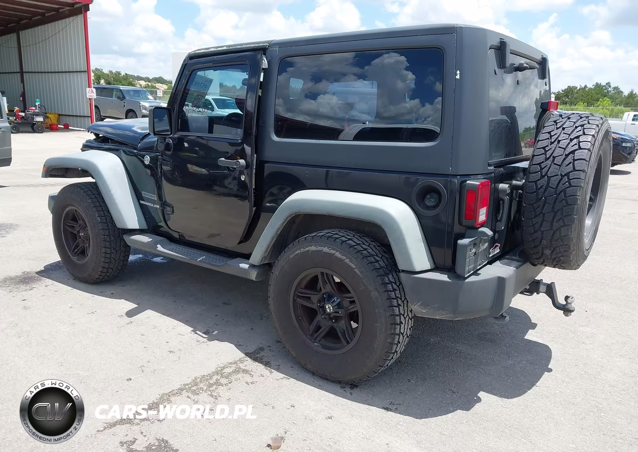 2011 Jeep Wrangler Sport VIN:1J4AA2D19BL580604 - 3