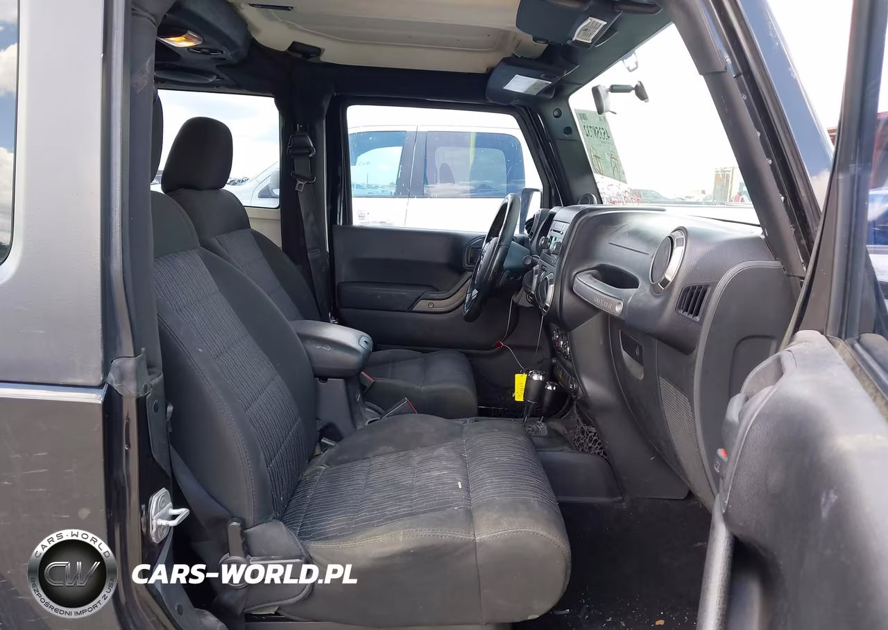 2011 Jeep Wrangler Sport VIN:1J4AA2D19BL580604 - 5