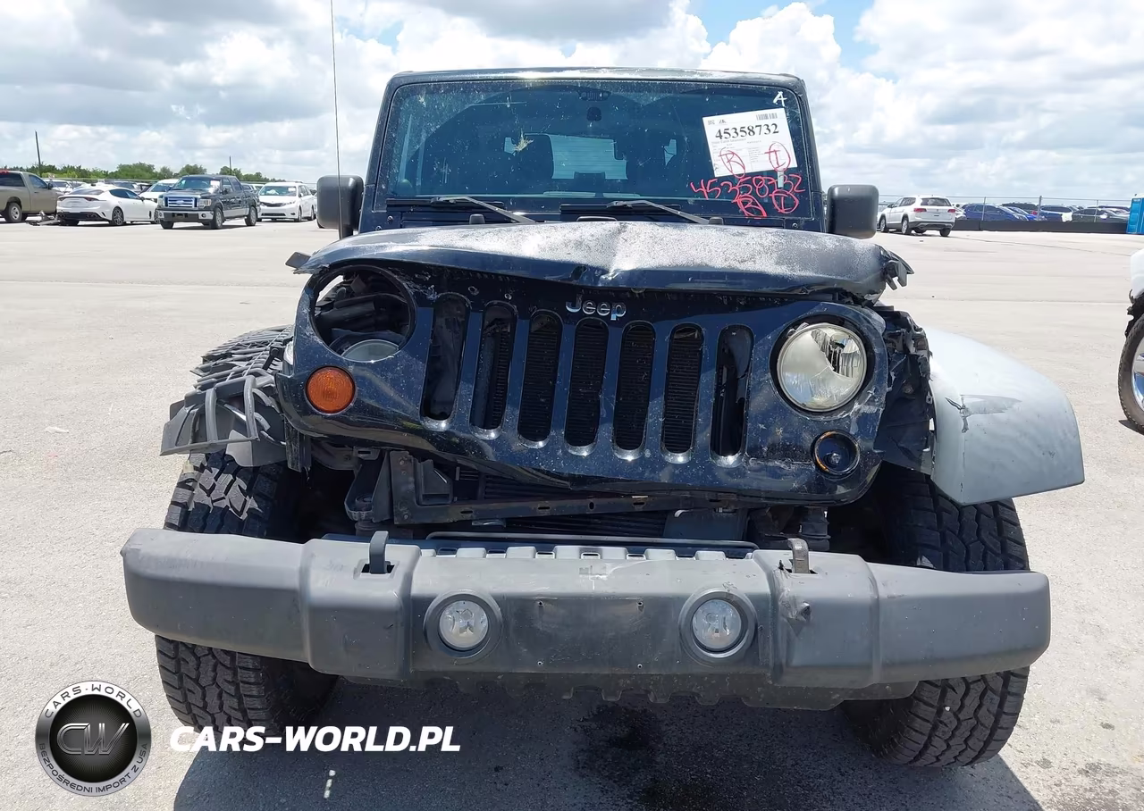 2011 Jeep Wrangler Sport VIN:1J4AA2D19BL580604 - 6