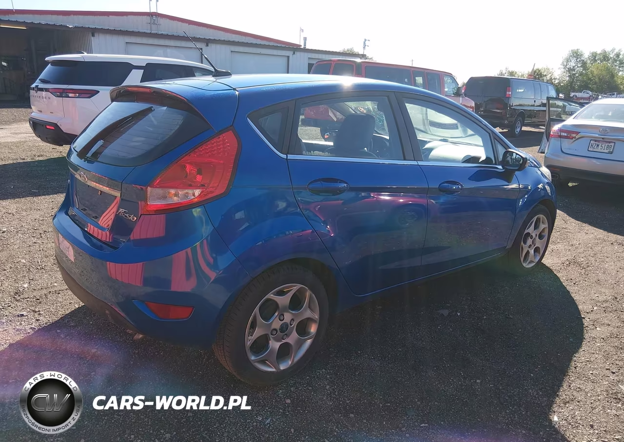 2011 Ford Fiesta Ses VIN:3FADP4FJ3BM125763 - 4