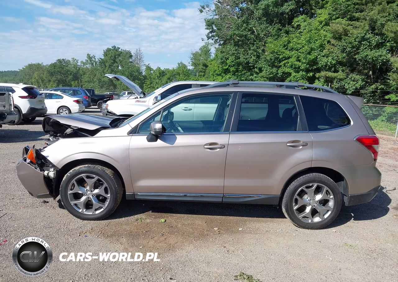 2015 Subaru Forester 2.5I Touring VIN:JF2SJAUCXFH426810 - 14