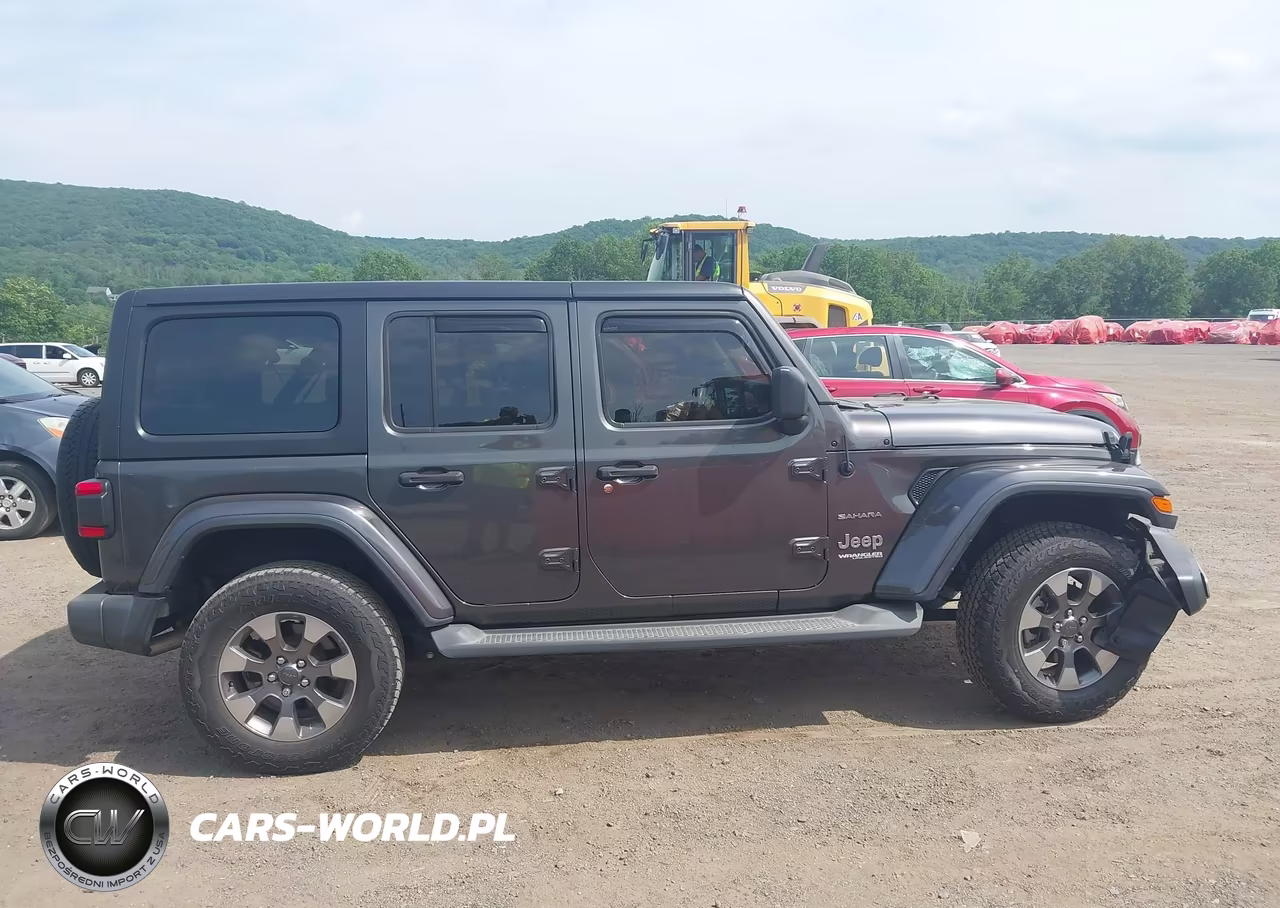 2019 Jeep Wrangler Unlimited Sahara 4X4 VIN:1C4HJXEG5KW526445 - 13