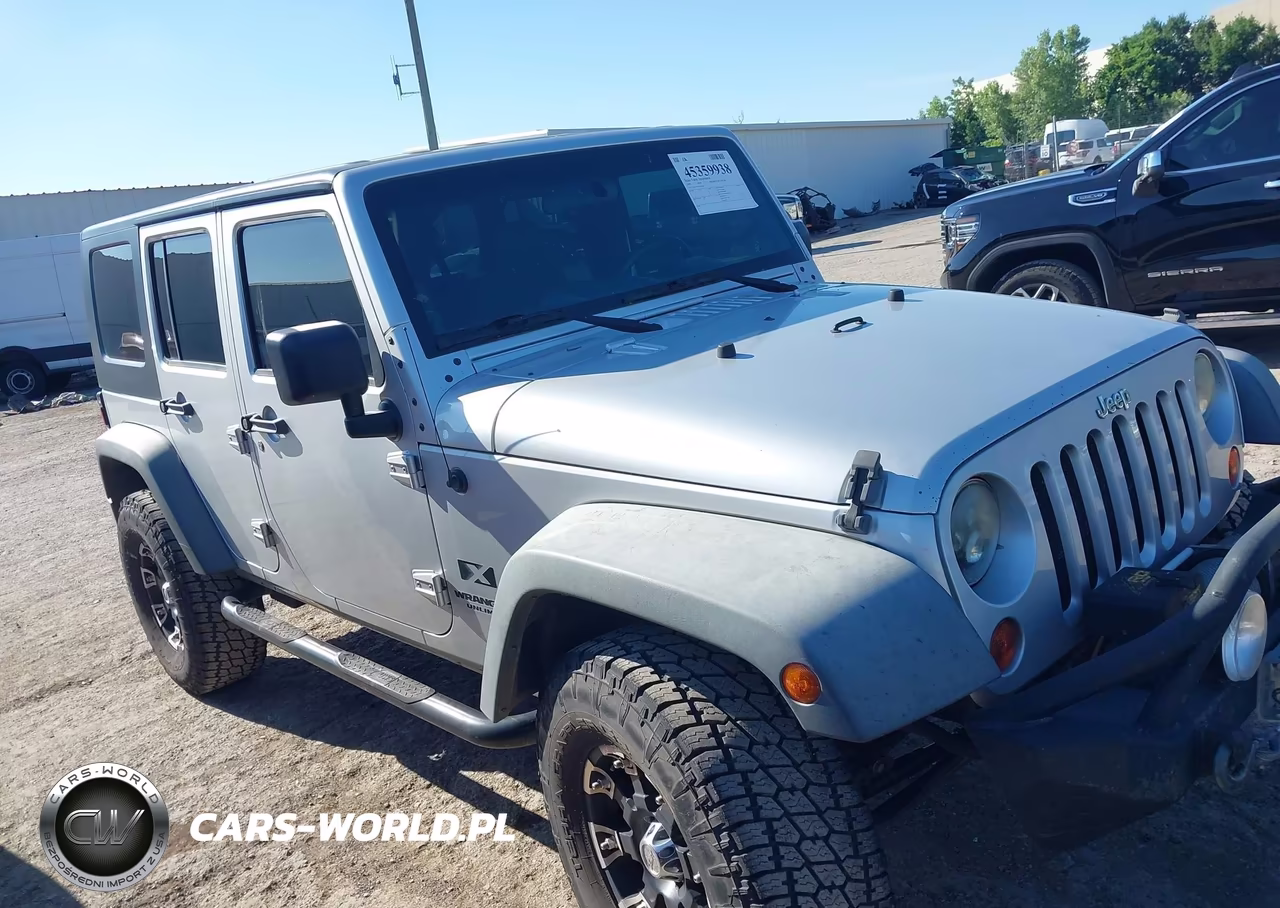 2009 Jeep Wrangler Unlimited X VIN:1J4GA39189L768243 - 14