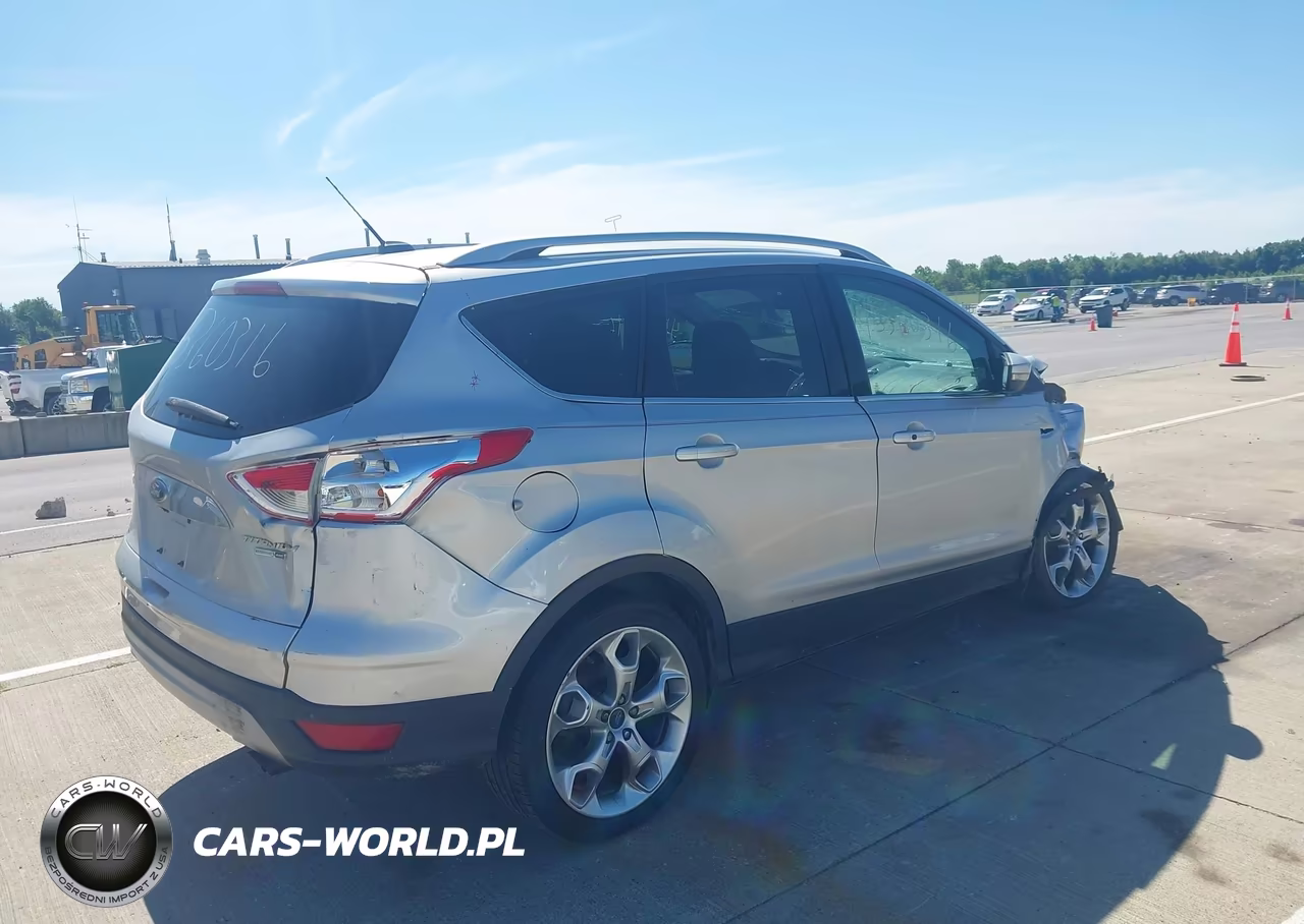 2015 Ford Escape Titanium VIN:1FMCU9J99FUB38555 - 4