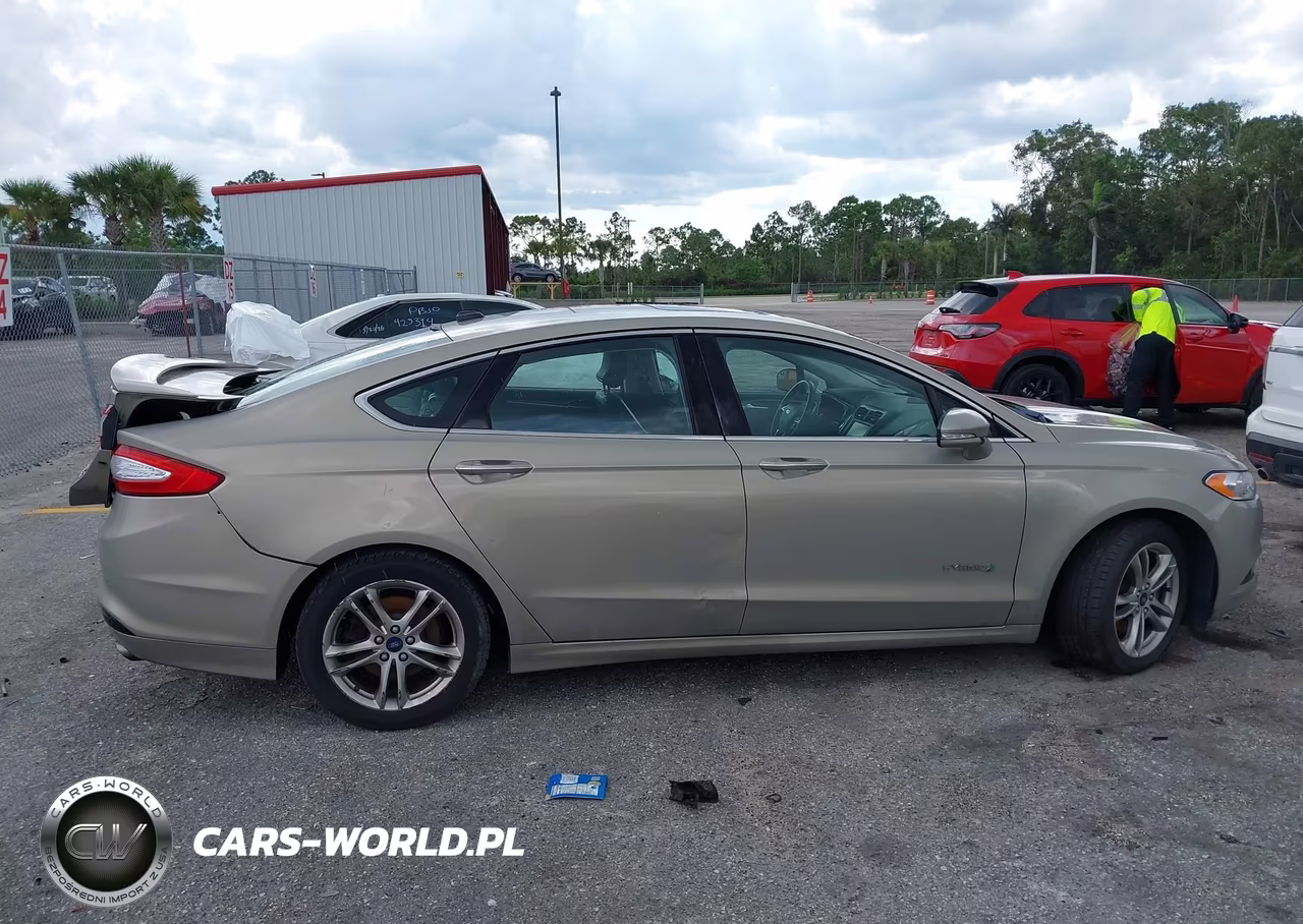 2015 Ford Fusion Hybrid Titanium VIN:3FA6P0RU6FR287287 - 12