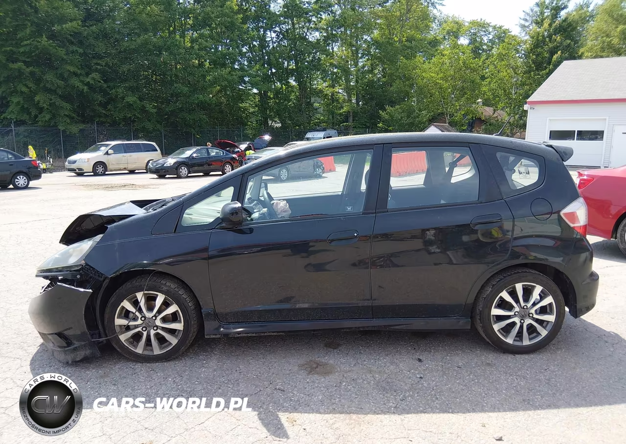 2012 Honda Fit Sport VIN:JHMGE8H57CC018575 - 14