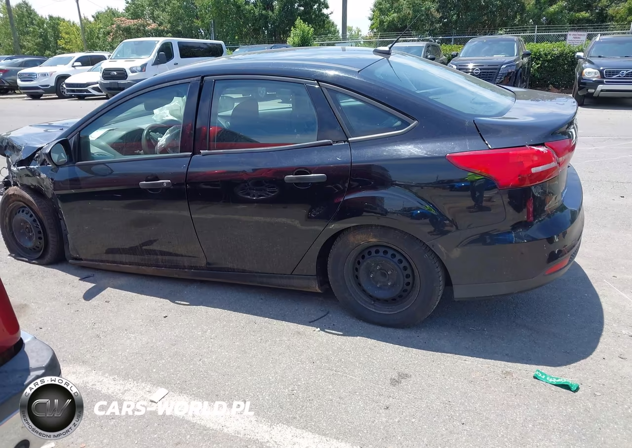 2016 Ford Focus S VIN:1FADP3E22GL241453 - 14