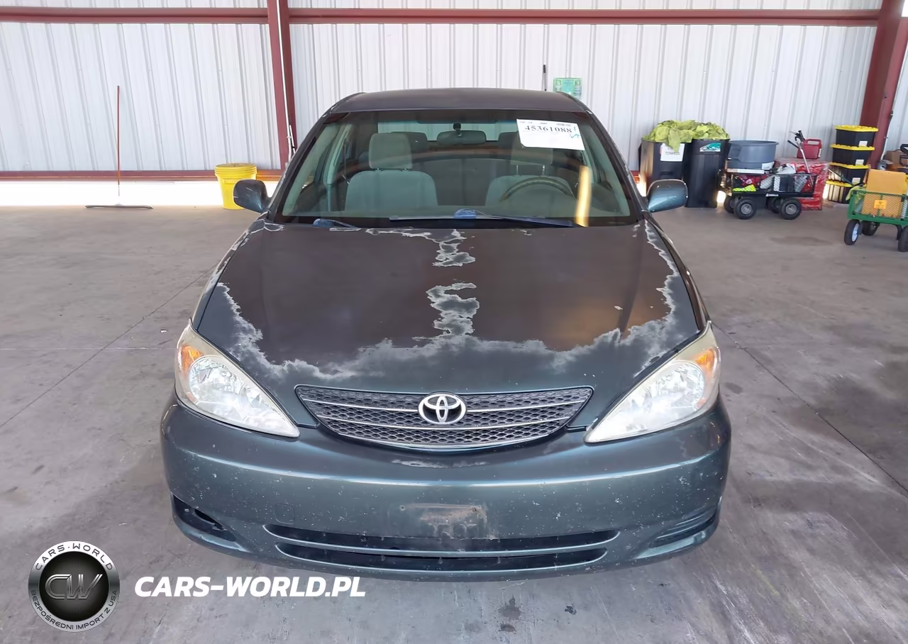 2002 Toyota Camry Le VIN:JTDBE32K820068401 - 13