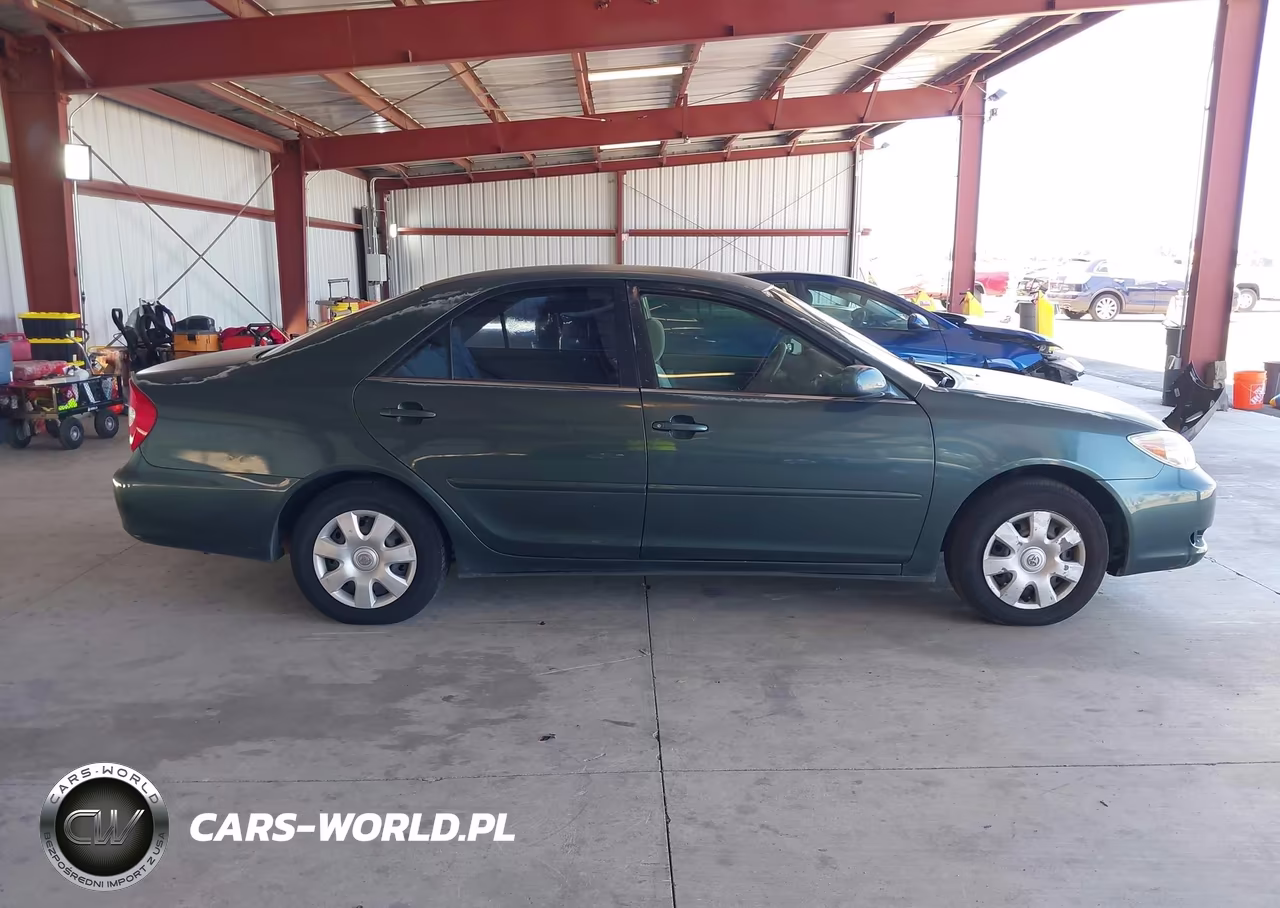 2002 Toyota Camry Le VIN:JTDBE32K820068401 - 14