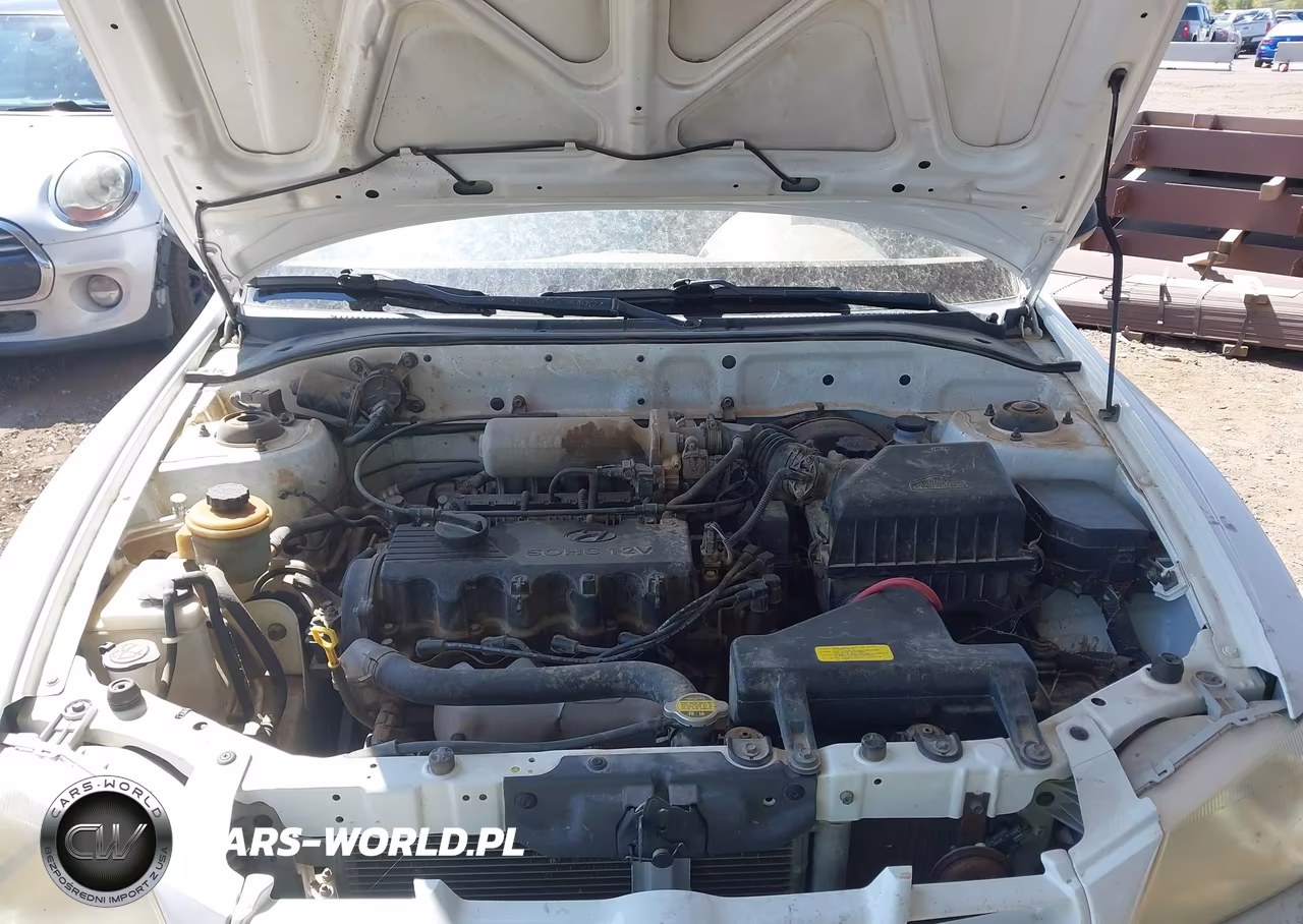 2002 Hyundai Accent L VIN:KMHCF35G62U160703 - 10
