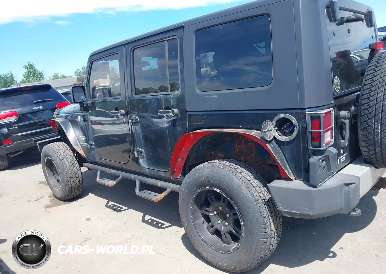 2010 Jeep Wrangler Unlimited Sahara VIN:1J4BA5H17AL220293 - 14