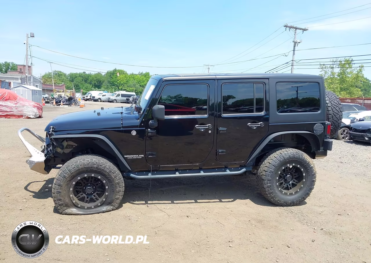 2013 Jeep Wrangler Unlimited Sport VIN:1C4BJWDGXDL667677 - 14
