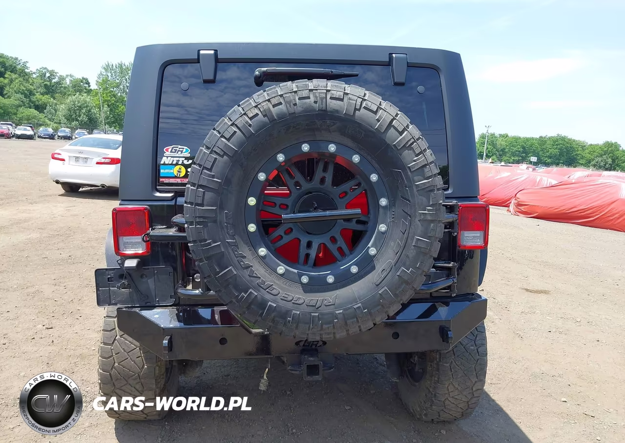 2013 Jeep Wrangler Unlimited Sport VIN:1C4BJWDGXDL667677 - 16