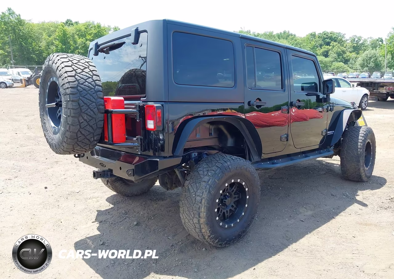 2013 Jeep Wrangler Unlimited Sport VIN:1C4BJWDGXDL667677 - 4