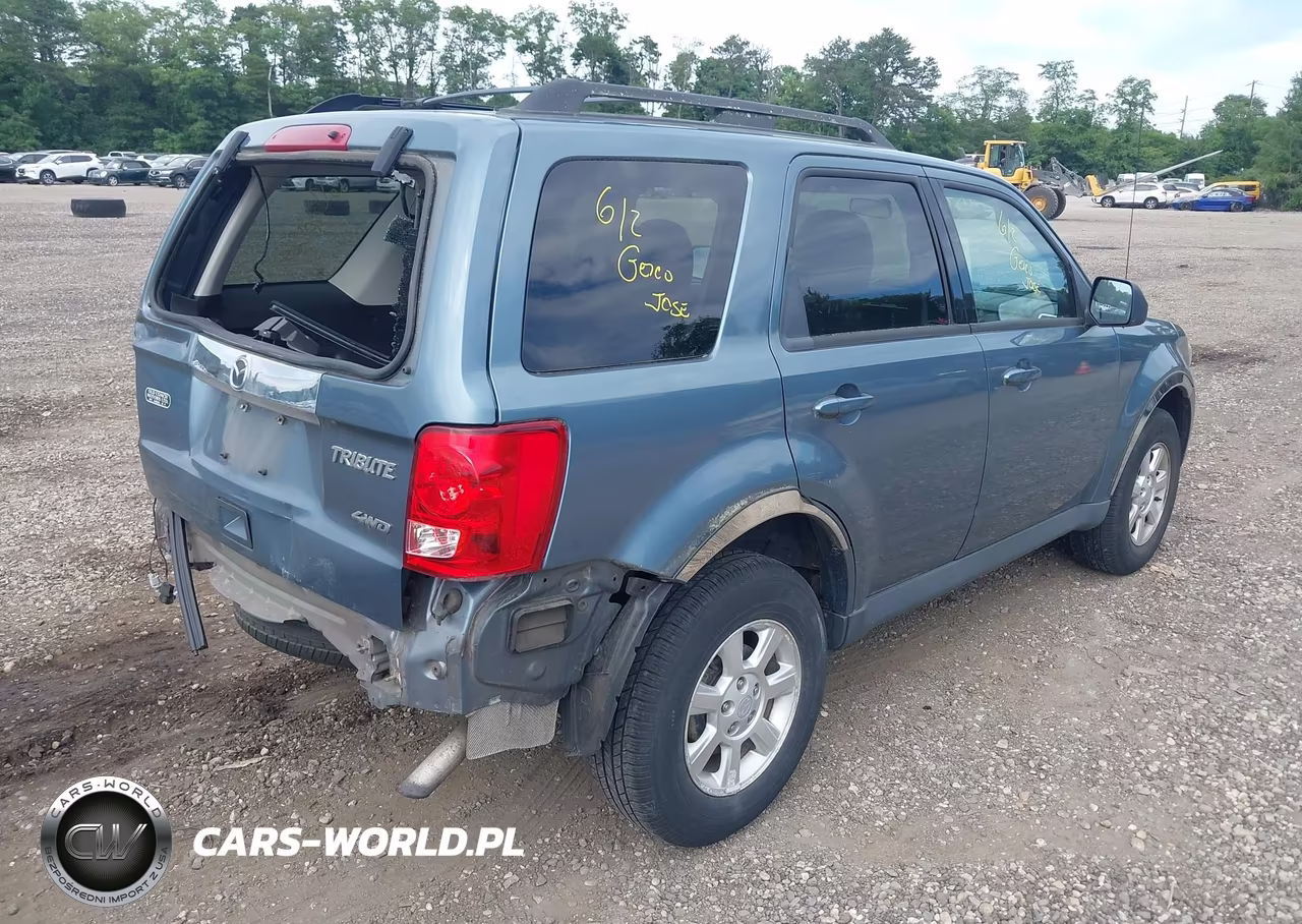 2011 Mazda Tribute I Touring VIN:4F2CY9C78BKM00043 - 4