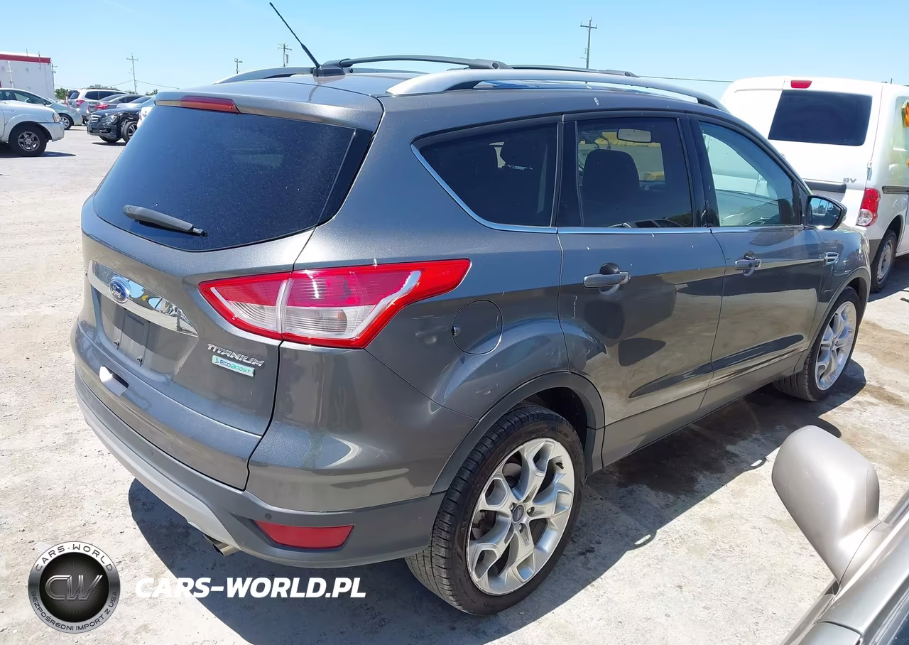 2014 Ford Escape Titanium VIN:1FMCU0JX5EUC52450 - 4
