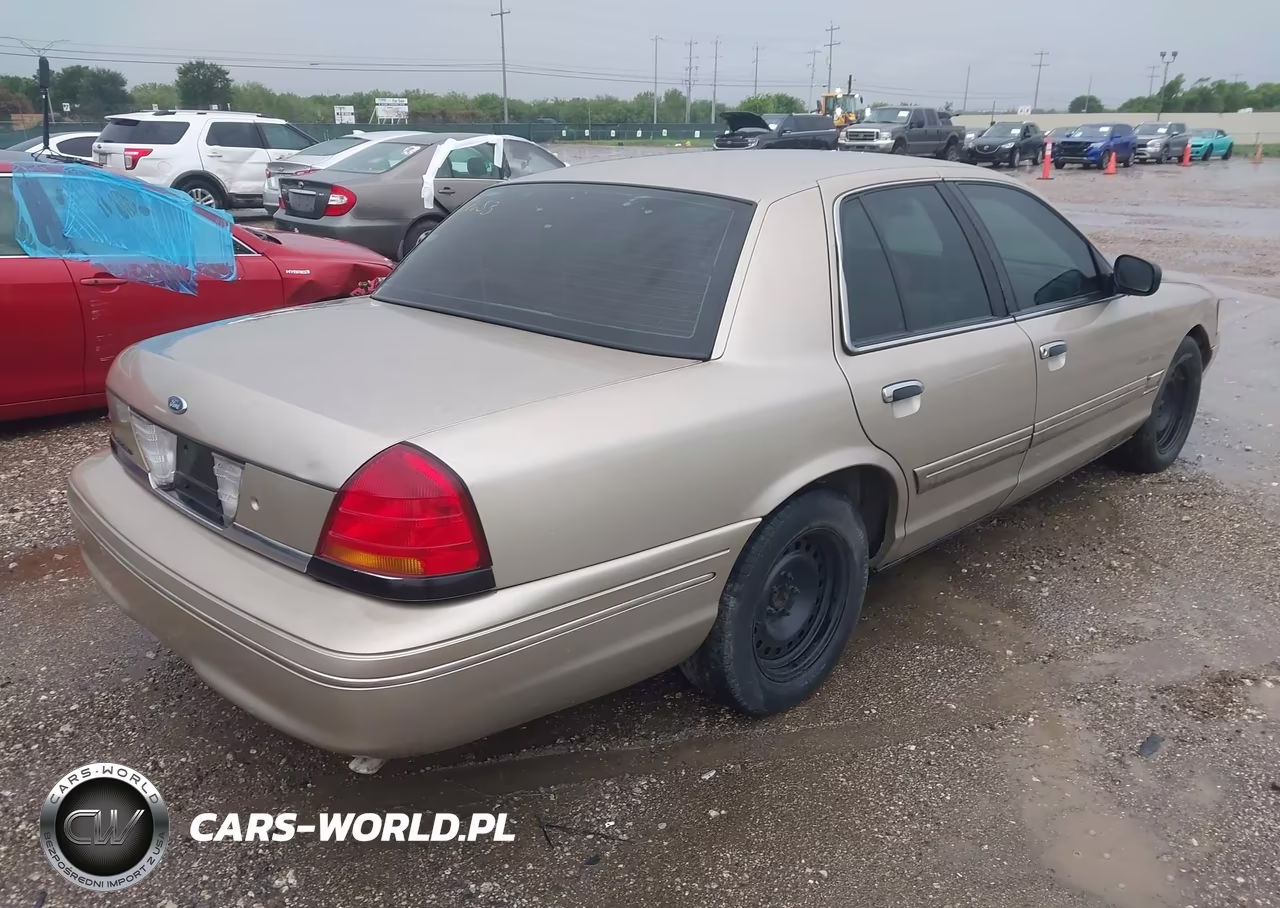 2000 Ford Crown Victoria VIN:2FAFP73W7YX125627 - 4