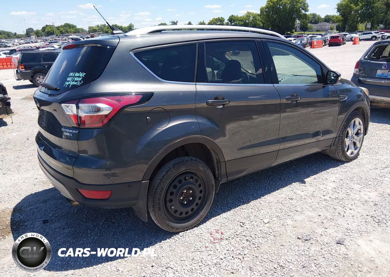 2018 Ford Escape Titanium VIN:1FMCU9J95JUD19614 - 4