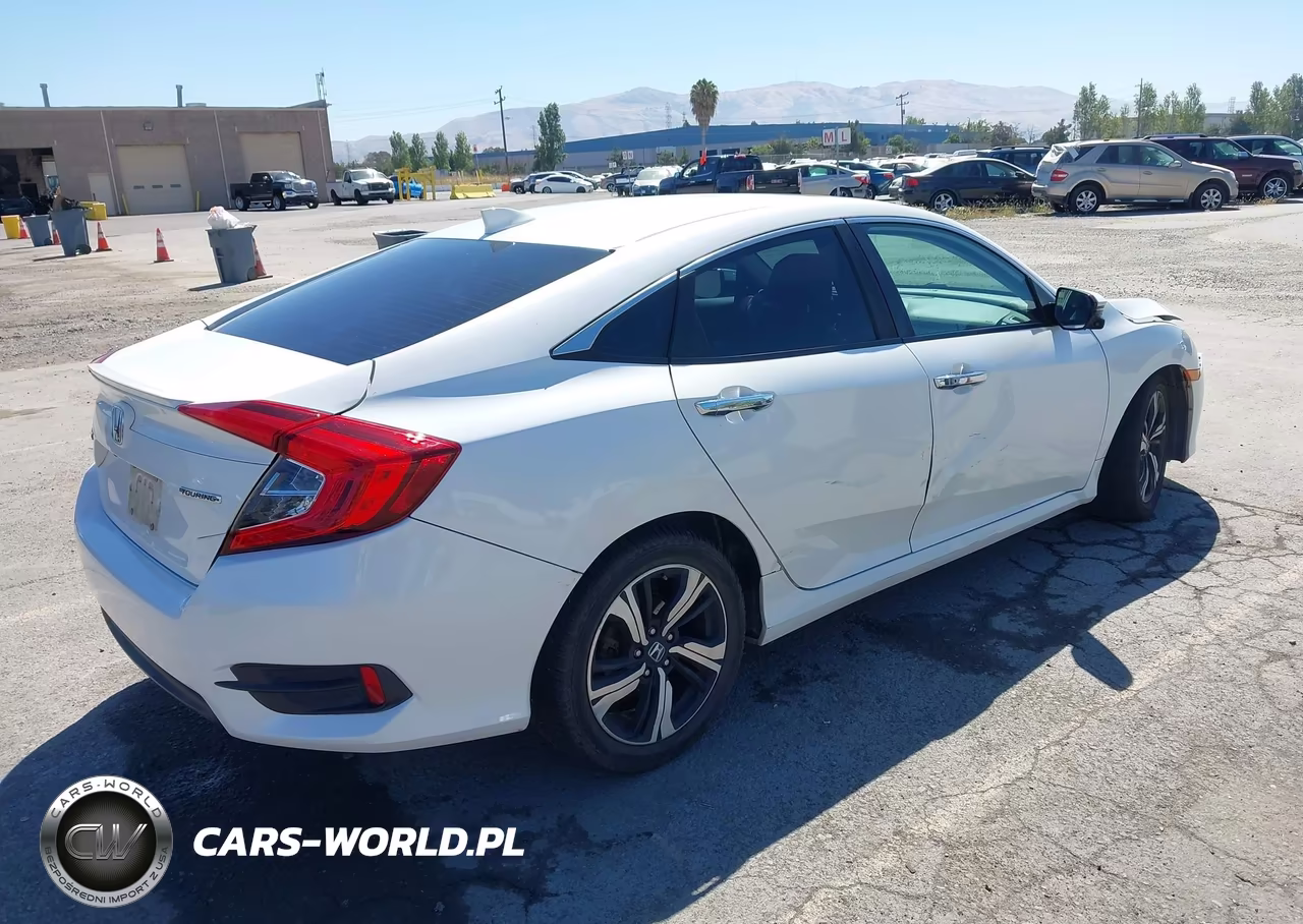 2016 Honda Civic Touring VIN:19XFC1F98GE213499 - 4