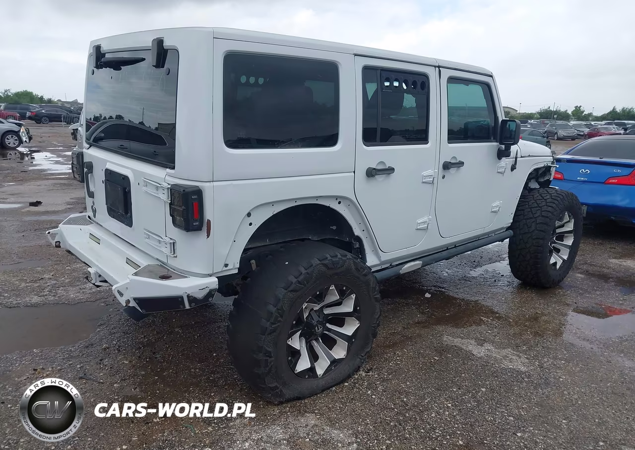 2016 Jeep Wrangler Unlimited Sport VIN:1C4BJWDG0GL157245 - 4