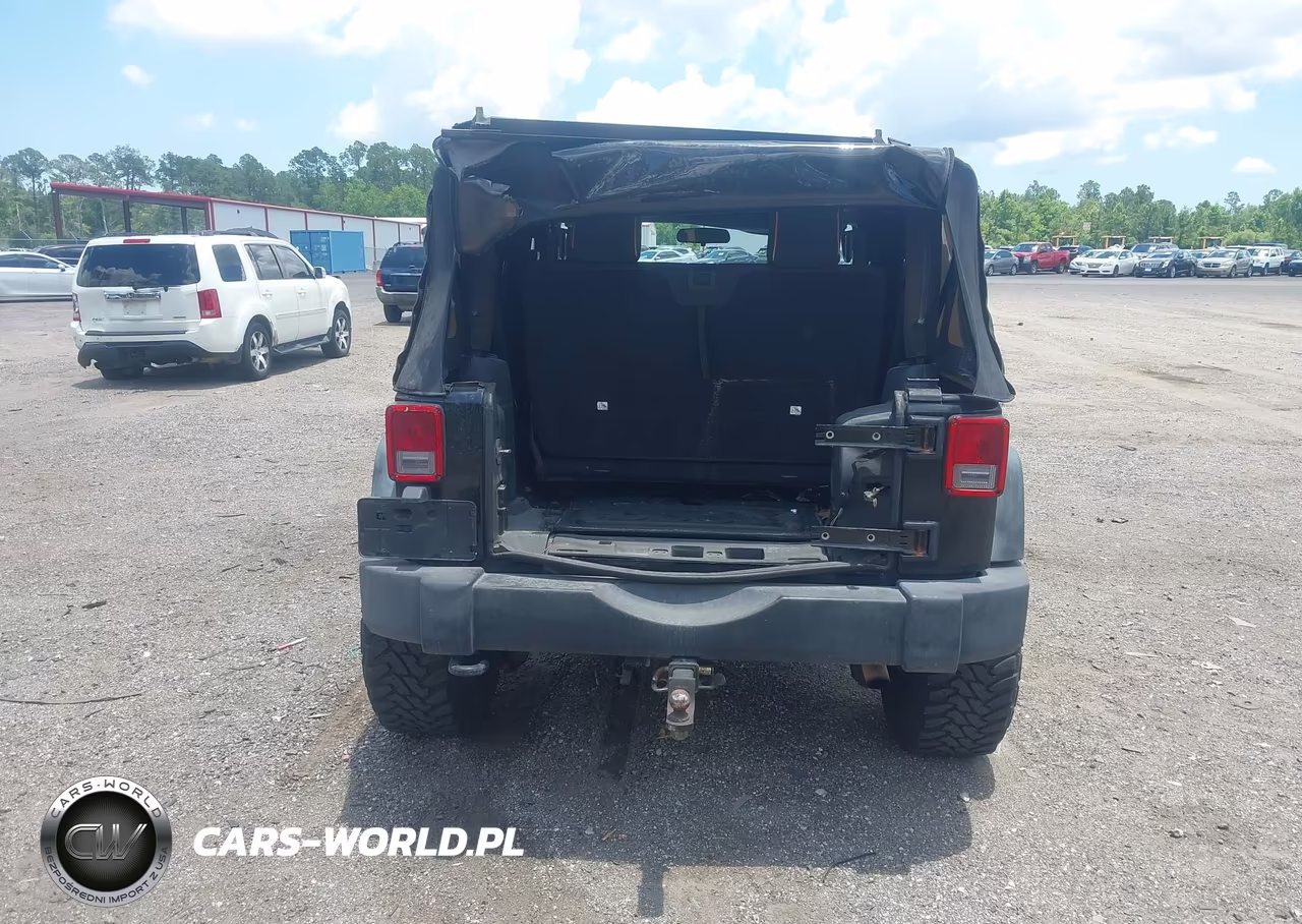 2011 Jeep Wrangler Sport VIN:1J4AA2D16BL620430 - 17
