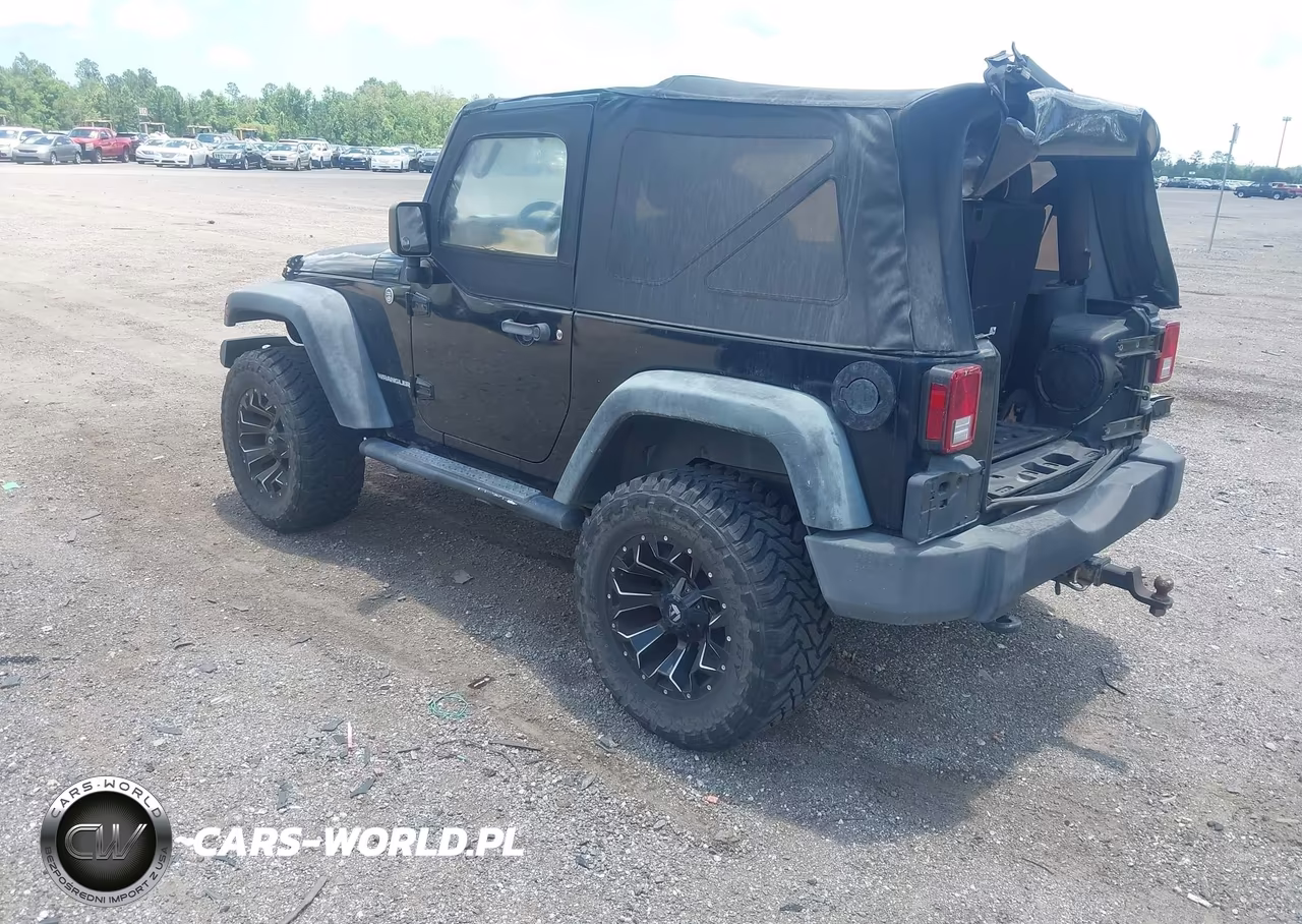 2011 Jeep Wrangler Sport VIN:1J4AA2D16BL620430 - 3