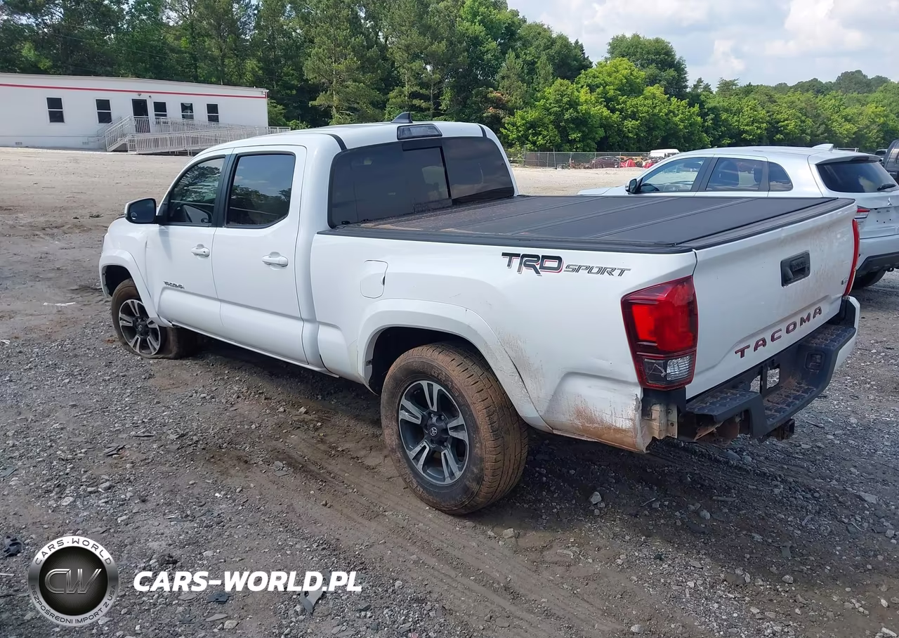 2018 Toyota Tacoma VIN:5TFBZ5DN3JX004294 - 3
