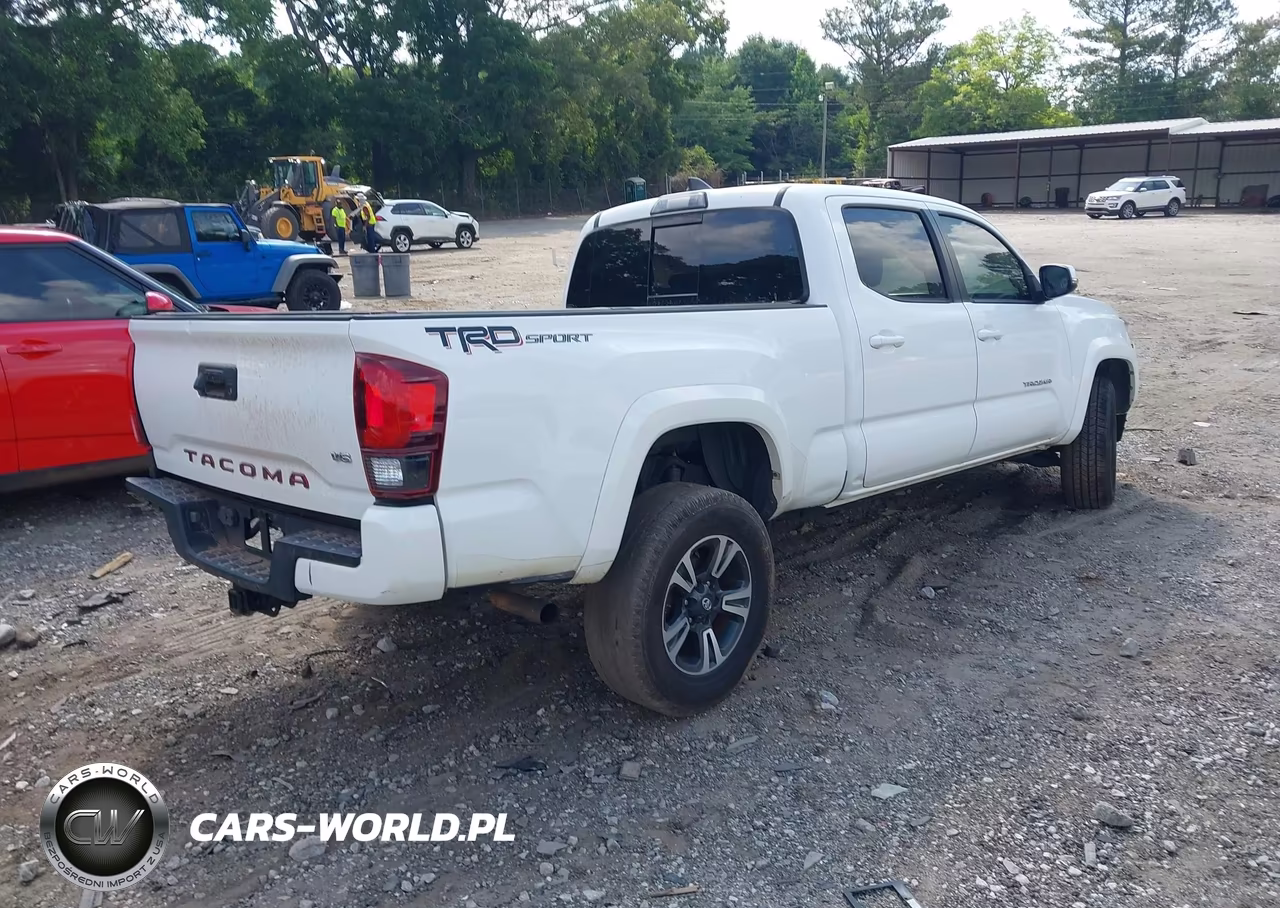 2018 Toyota Tacoma VIN:5TFBZ5DN3JX004294 - 4