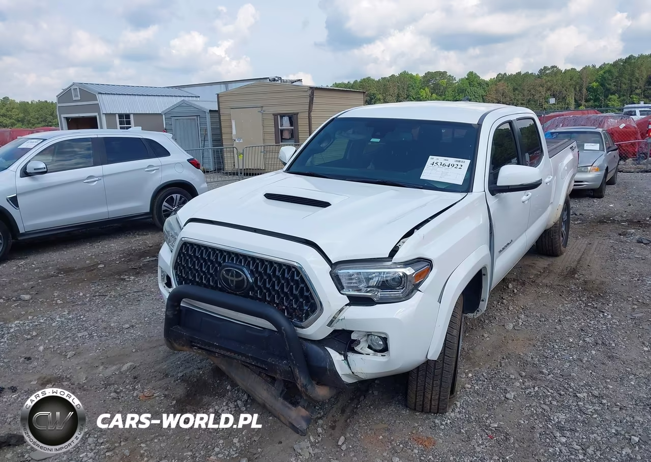 2018 Toyota Tacoma VIN:5TFBZ5DN3JX004294 - 6