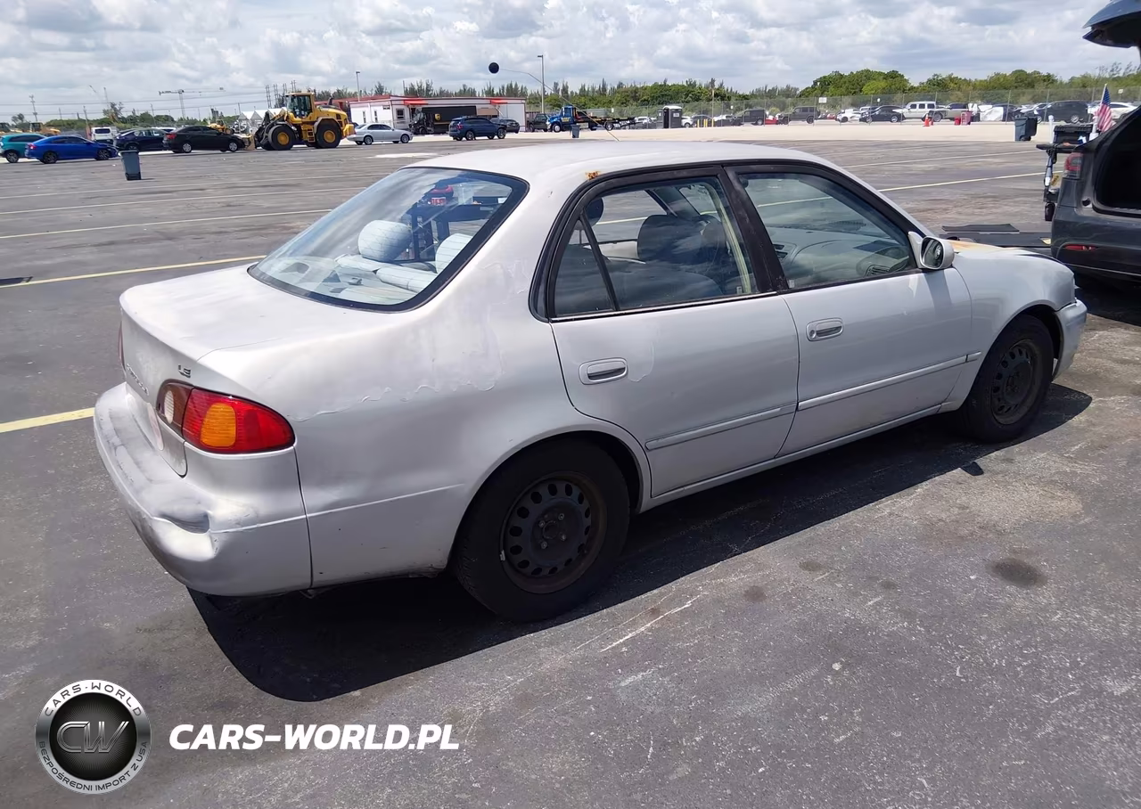 2002 Toyota Corolla Le VIN:1NXBR12E72Z598317 - 4