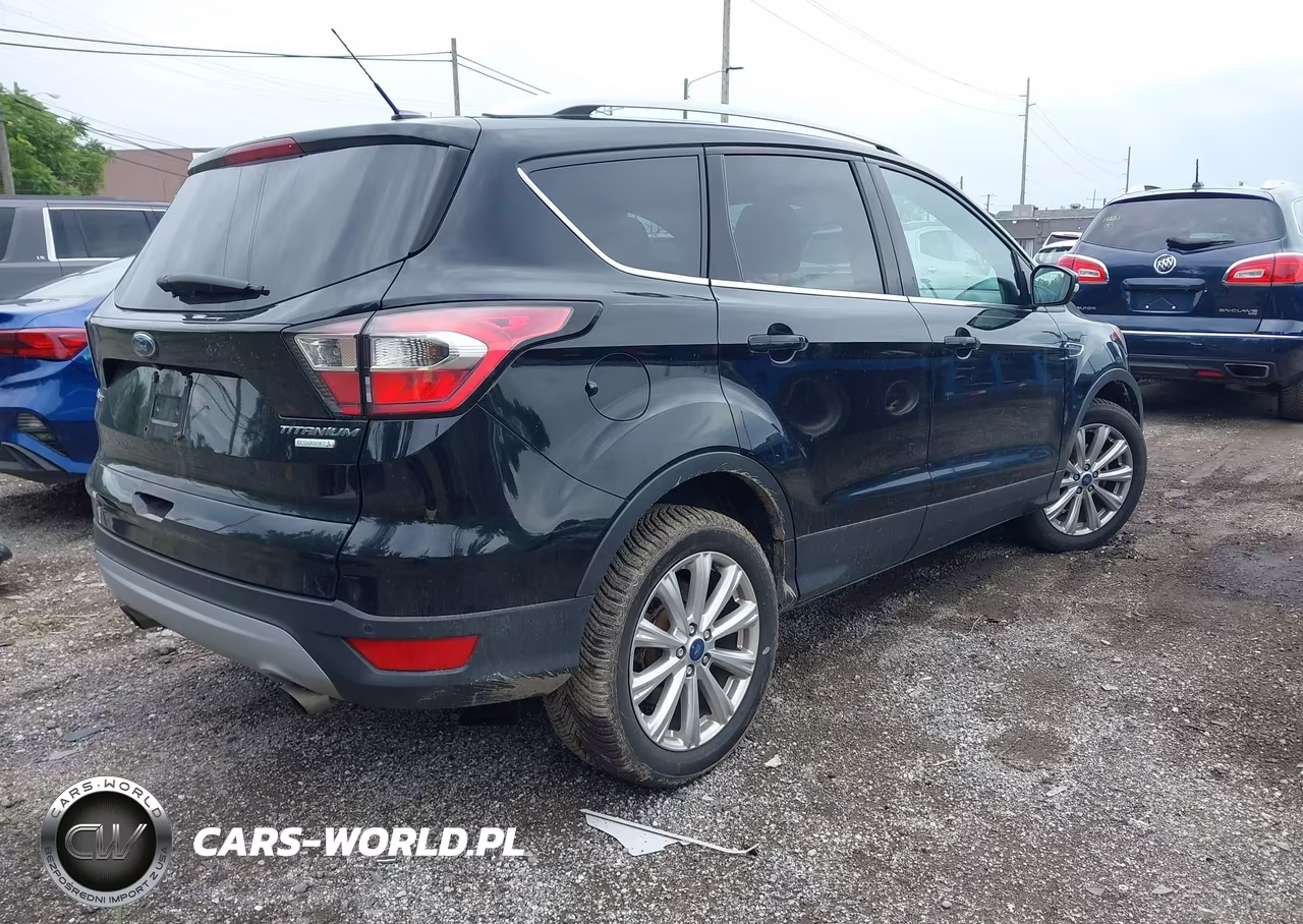 2017 Ford Escape Titanium VIN:1FMCU0JD7HUD65083 - 4
