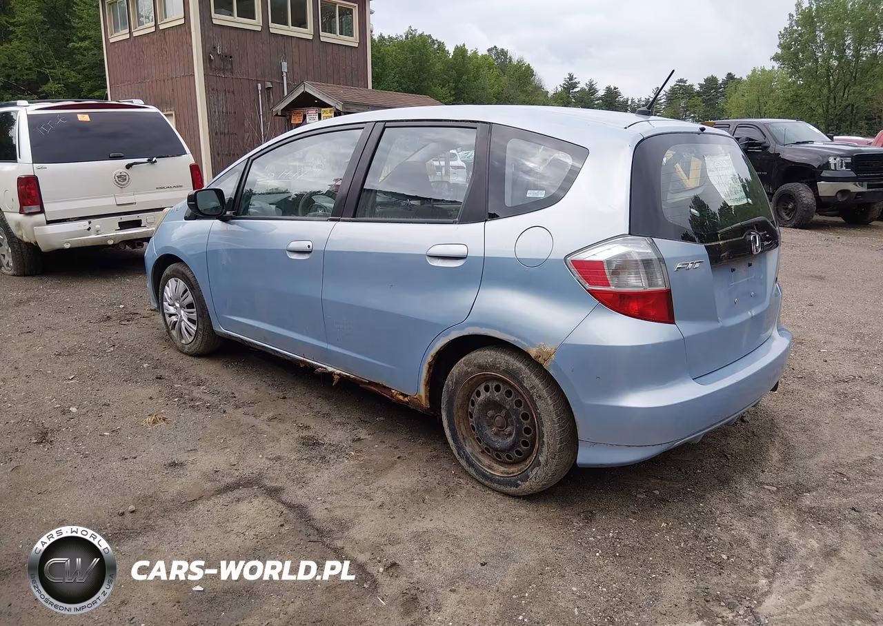 2009 Honda Fit VIN:JHMGE87259C006747 - 3