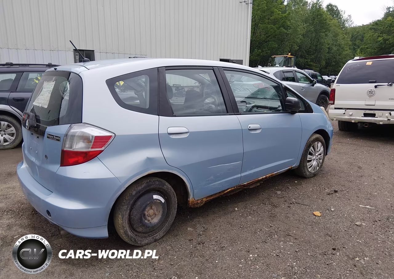2009 Honda Fit VIN:JHMGE87259C006747 - 4