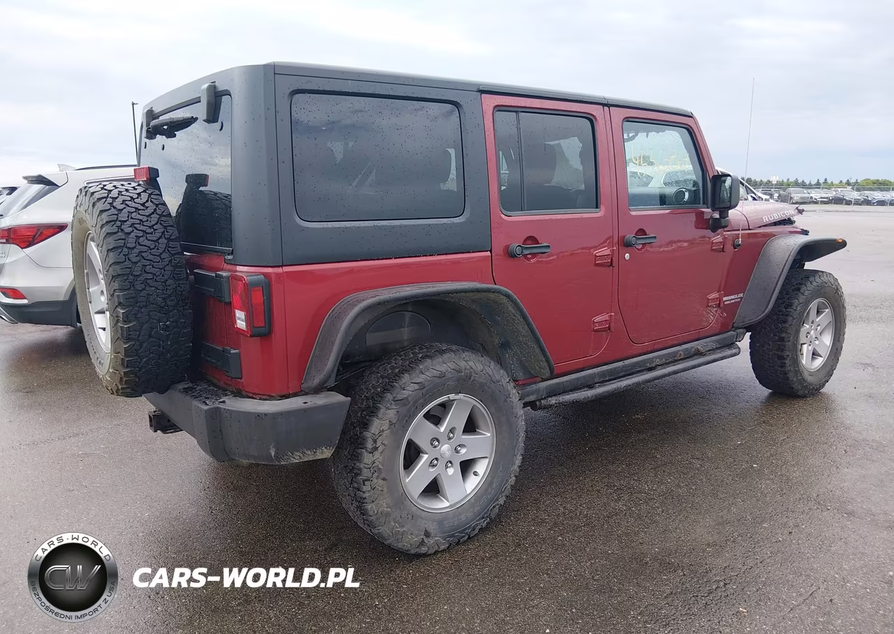 2012 Jeep Wrangler Unlimited Rubicon VIN:1C4HJWFG4CL106851 - 4